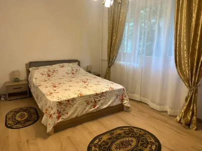 dormitor cu pat matrimonial inchiriere apartament Sector 4 București